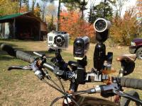 Contour, GoPro, and Sony helmet cams mounted side-by-side
